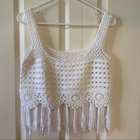 3/$25.00 🛍 
White Cropped Knitted Top with Fringes - Picture 2 of 3